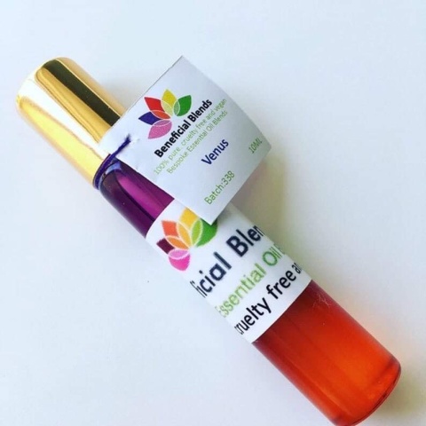 oil blend in a glass bottle with pink to orange gradient. Label reads 'Venus', 100% pure, cruelty free and vegan bespoke essential oil blends. 10ml.