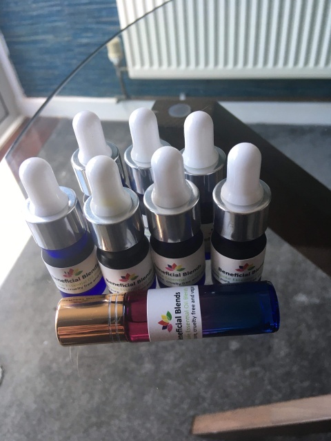 essential oils in different coloured bottles